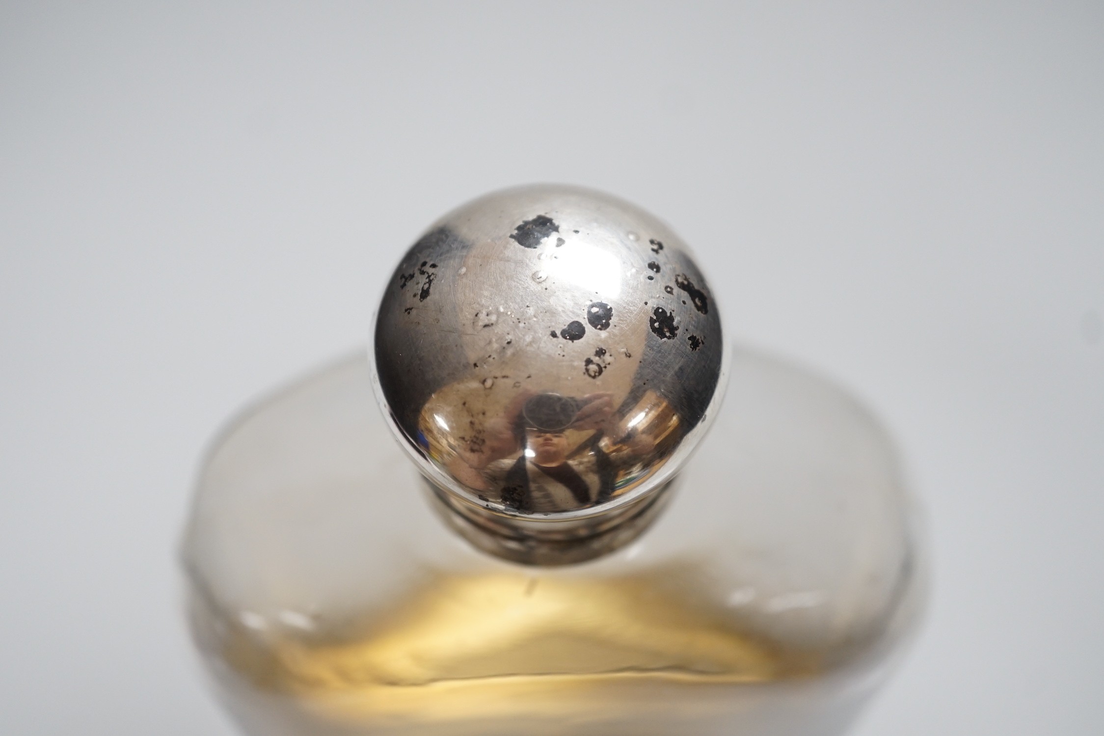 A Goliath size silver plate mounted hip flask, 23.5cm